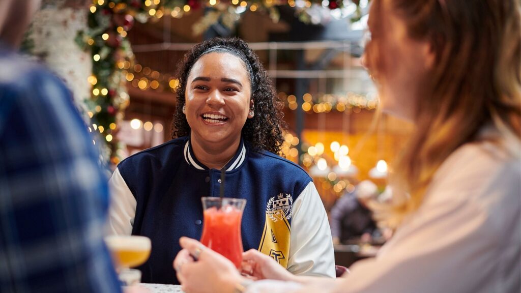 Students enjoy cocktails in a bar in ormskirk