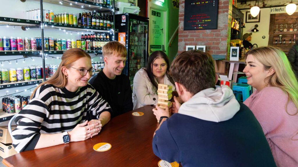 Students socialising in a bar in Ormskirk town centre